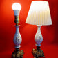 Pair Bisque Porcelain Mid Century Accent Table Lamps Off White w/ Embossed Cherubs/Angels Gold Cast Brass Footed Base Rococo Style Retro
