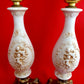 Pair Bisque Porcelain Mid Century Accent Table Lamps Off White w/ Embossed Cherubs/Angels Gold Cast Brass Footed Base Rococo Style Retro