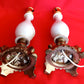 Pair Bisque Porcelain Mid Century Accent Table Lamps Off White w/ Embossed Cherubs/Angels Gold Cast Brass Footed Base Rococo Style Retro