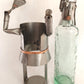 Metal Art Sculpture Female Tennis Player Figurine Steel Copper Wine Bottle Holder Caddy w/ Embossed Green Glass Bottle